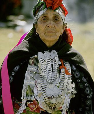 Chile. Cholchol (near Temuco). Mapuche Indian dressed for a festival.