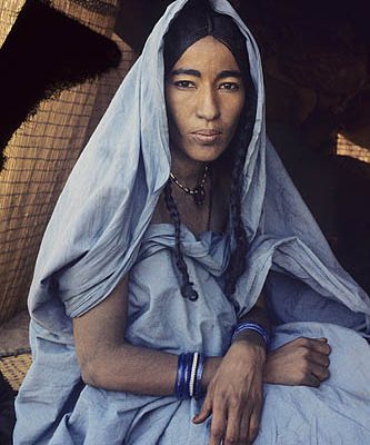 Niger Republic. Sahel. Tuareg nomad at the entrance of her tent.