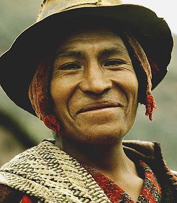 Peru. Pisac. Visiting Indian on market day 1.